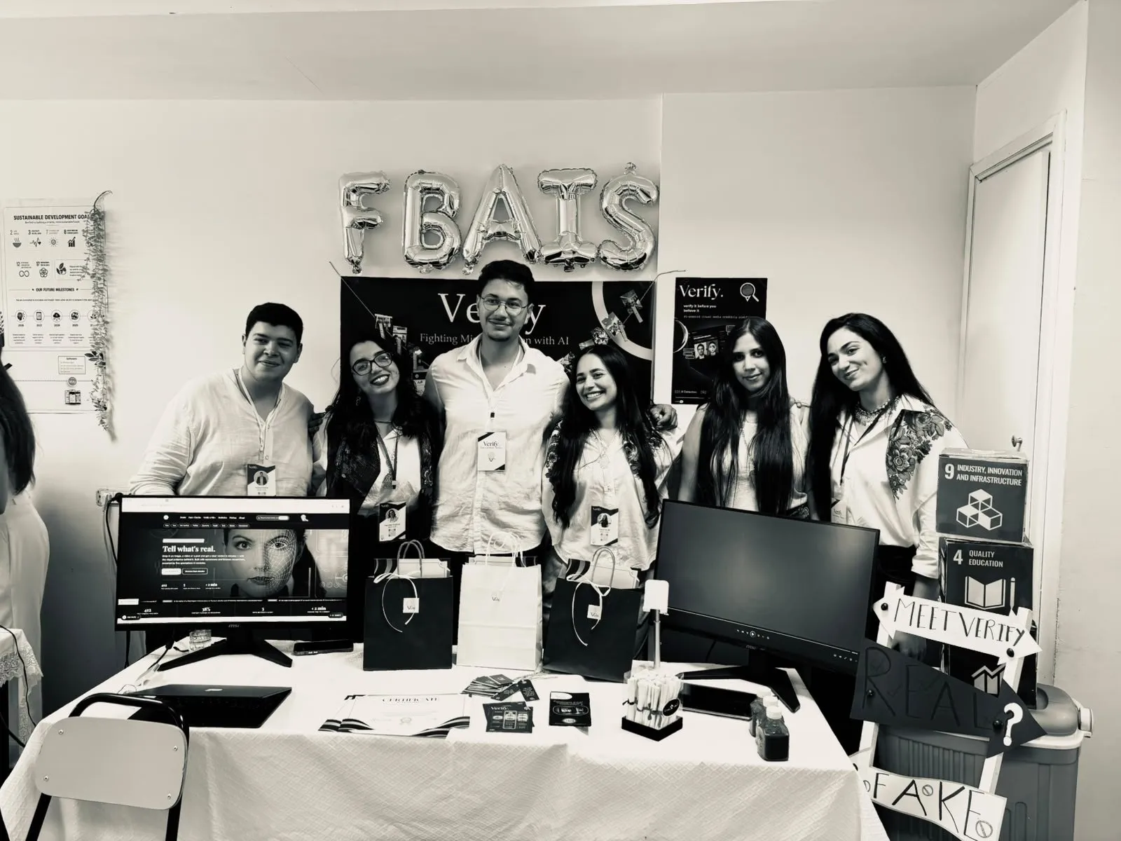 Black and white group photo of the six FBAI's team members.